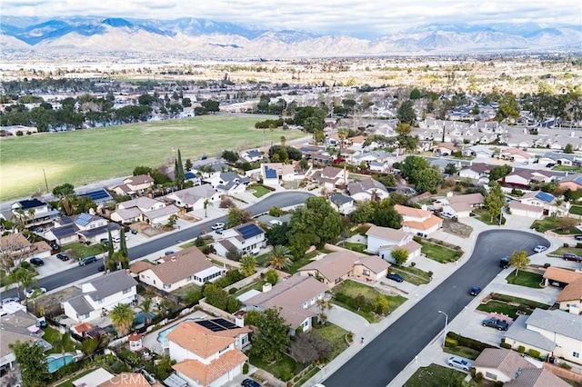 bird's eye view with a residential view and a mountain view