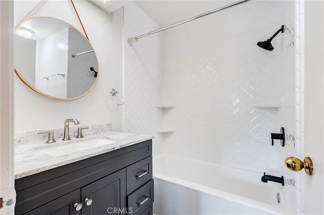 bathroom with washtub / shower combination and vanity