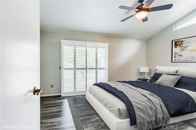 bedroom featuring access to exterior, lofted ceiling, ceiling fan, wood finished floors, and baseboards