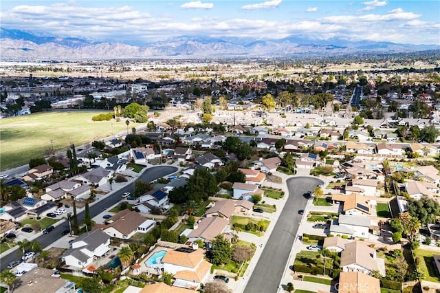 bird's eye view with a residential view and a mountain view