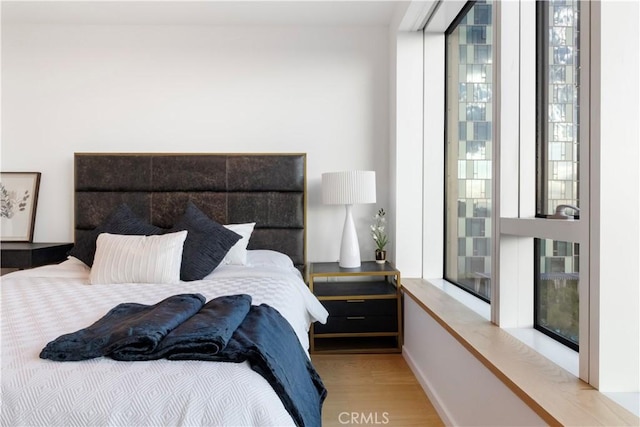 bedroom featuring hardwood / wood-style flooring