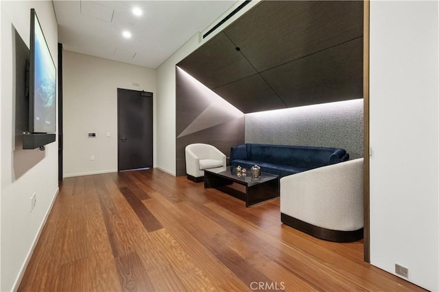 living area with wood-type flooring