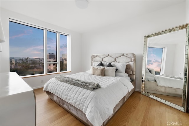 bedroom featuring light hardwood / wood-style floors