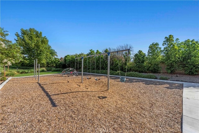 view of property's community with a playground