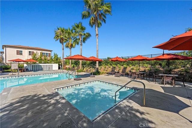 view of swimming pool featuring a patio area