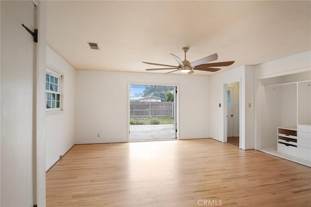 interior space featuring ceiling fan and light wood-type flooring