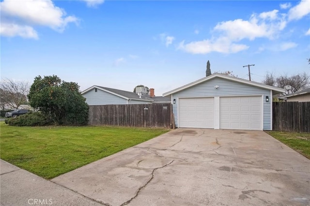 garage with a lawn