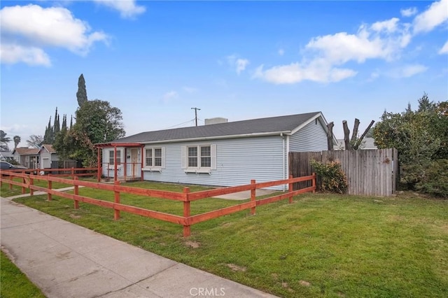 exterior space featuring a front yard