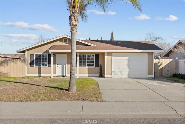 ranch-style home with a garage