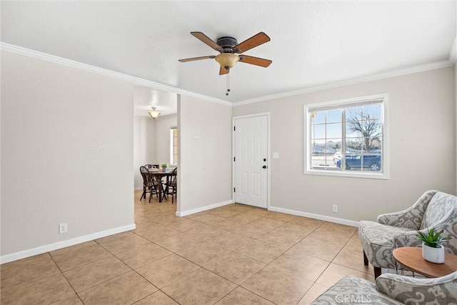 unfurnished room with crown molding, light tile patterned floors, and ceiling fan