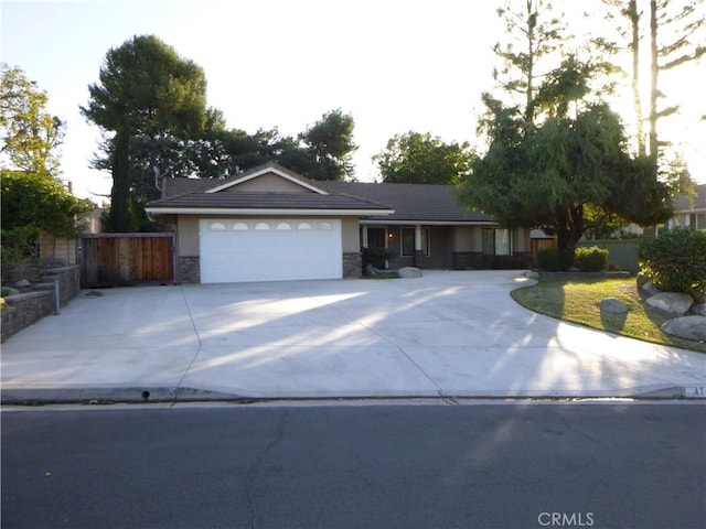 ranch-style home with a garage