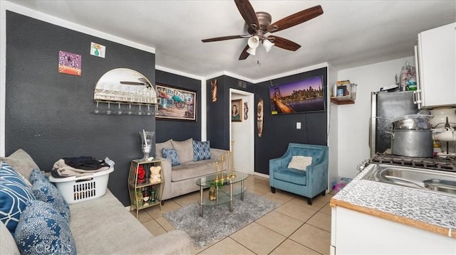 living room with light tile patterned flooring and ceiling fan