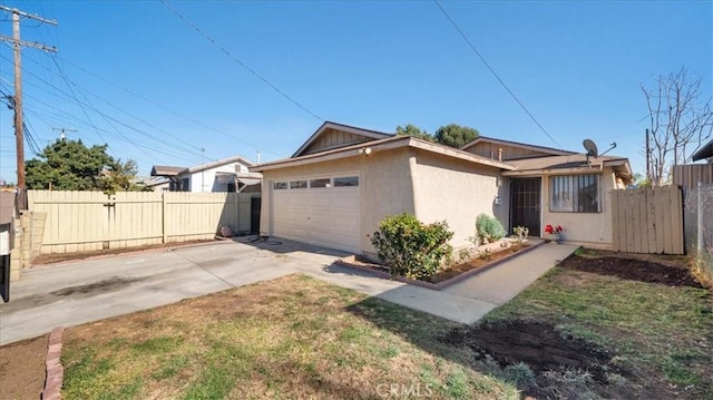 ranch-style house featuring a garage