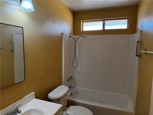 full bathroom featuring shower / washtub combination, toilet, and vanity