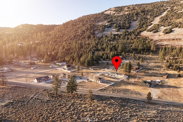 bird's eye view with a mountain view