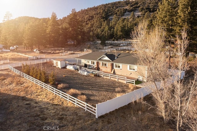 exterior space with a rural view