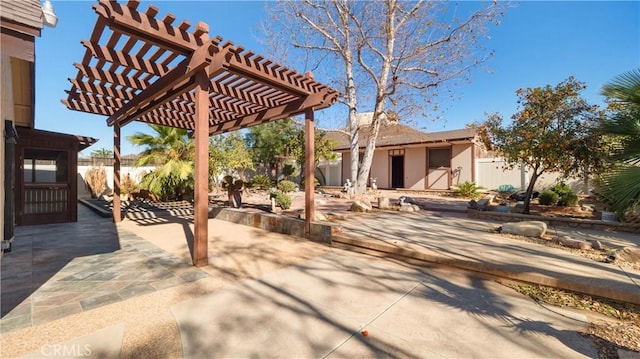 view of patio / terrace featuring a pergola