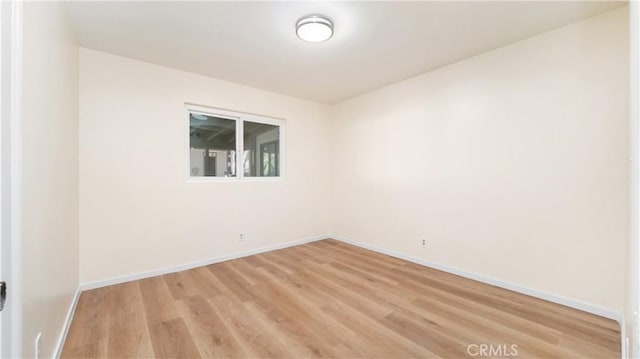 empty room featuring light hardwood / wood-style flooring