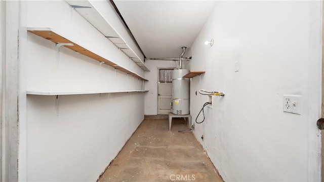 basement featuring strapped water heater