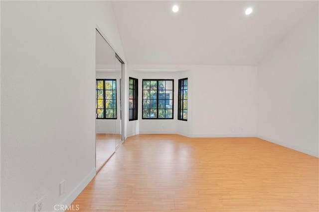 unfurnished room featuring light wood-type flooring