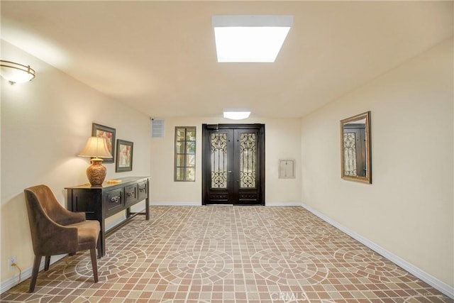 entrance foyer featuring french doors