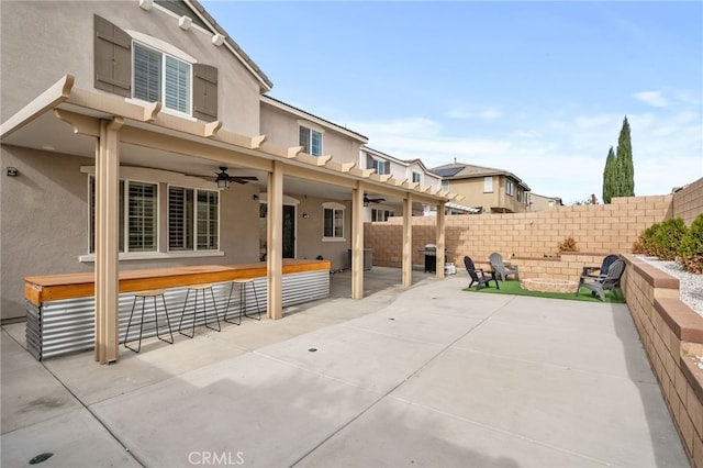 view of patio / terrace featuring ceiling fan