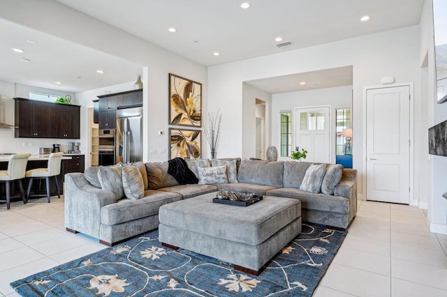 living room featuring light tile patterned floors