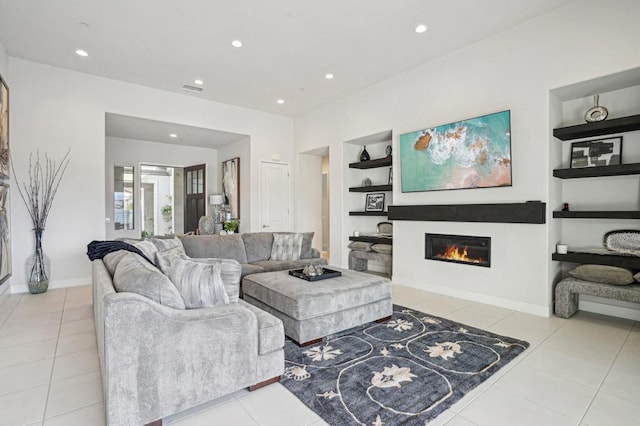 tiled living room with built in shelves