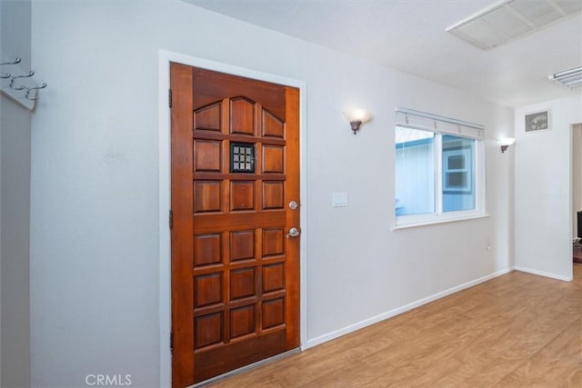 entrance foyer with light hardwood / wood-style floors