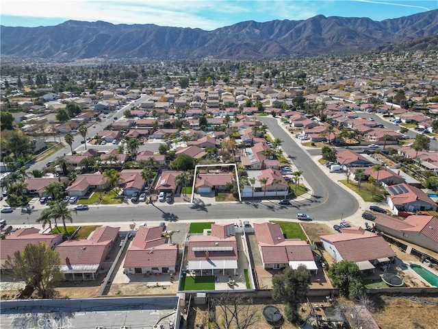 bird's eye view with a residential view and a mountain view