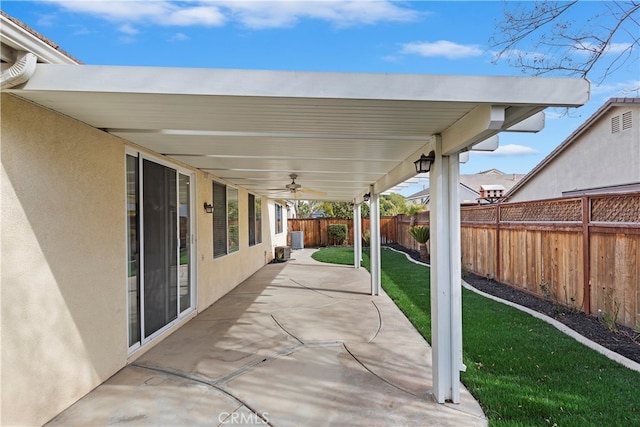 view of patio featuring ceiling fan