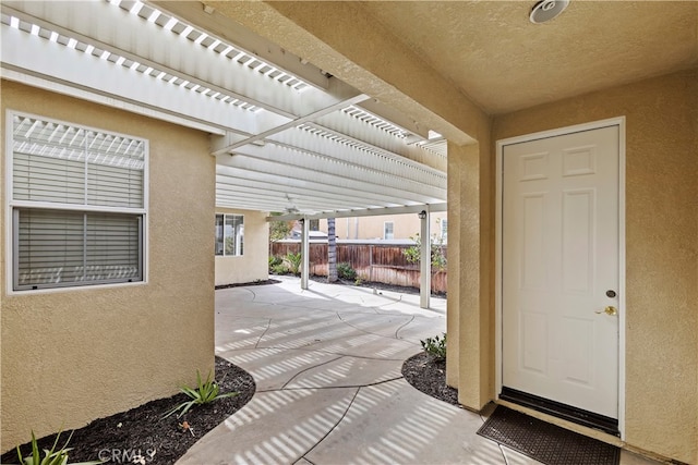 view of patio featuring a pergola