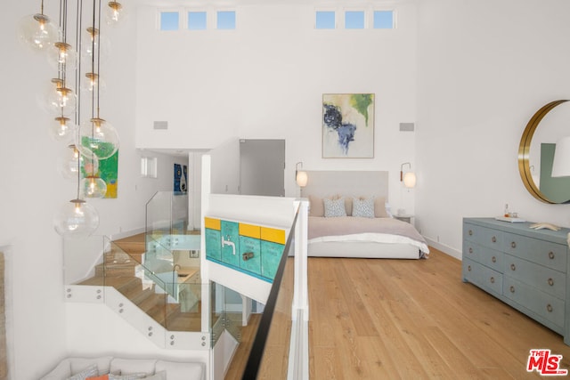 bedroom featuring wood-type flooring