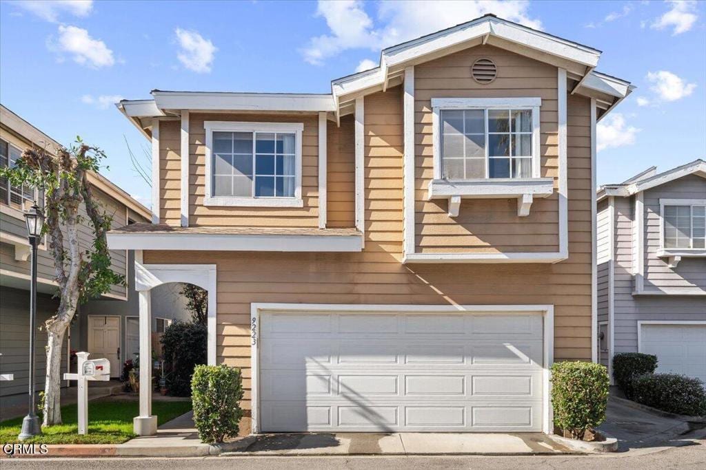 view of front of property featuring a garage