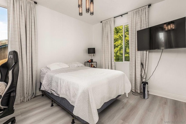 bedroom featuring light wood-type flooring