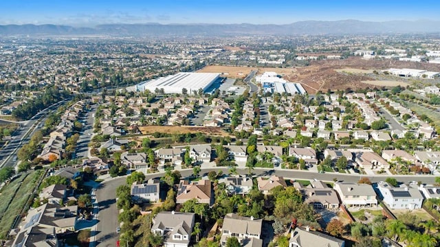 drone / aerial view featuring a mountain view