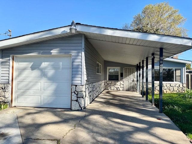 view of front of property with a carport