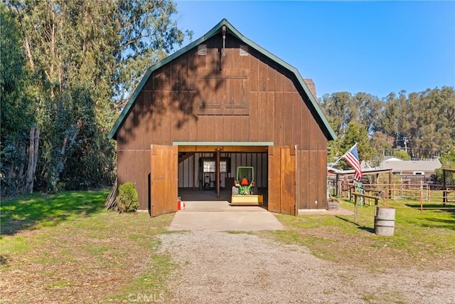 view of outdoor structure with a yard