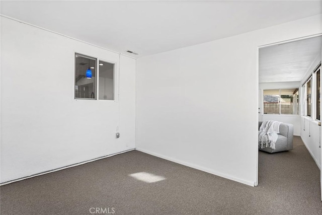 view of carpeted spare room