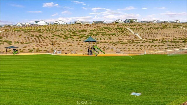 view of community featuring a playground