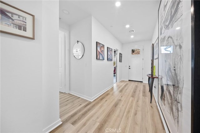 hallway featuring light hardwood / wood-style floors