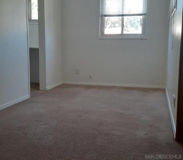 view of carpeted spare room