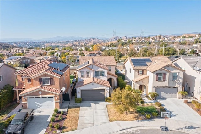 bird's eye view with a mountain view