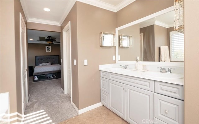 bathroom with vanity, ceiling fan, tile patterned floors, and crown molding