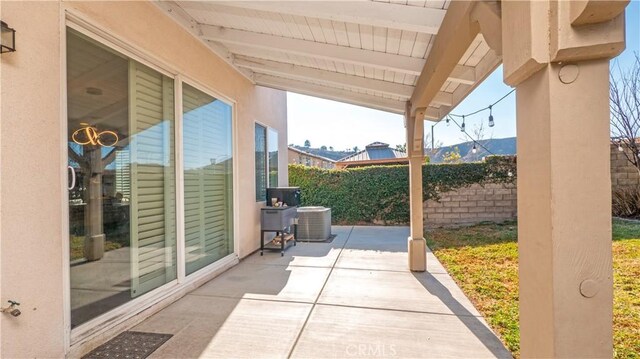 view of patio / terrace featuring central air condition unit