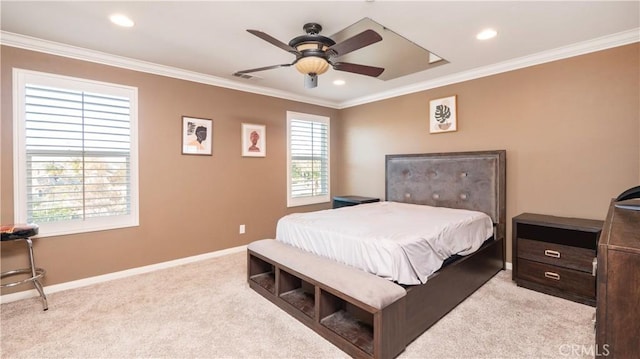 bedroom featuring ornamental molding, light colored carpet, and ceiling fan