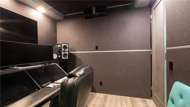 home theater featuring light hardwood / wood-style flooring