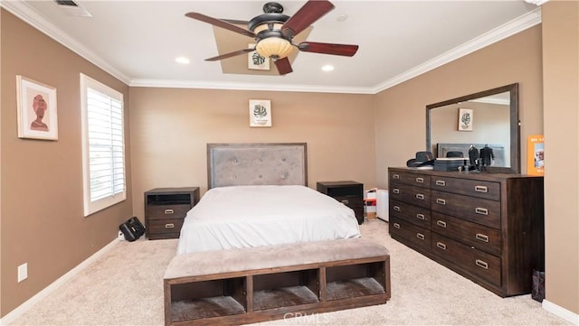 bedroom with crown molding, light colored carpet, and ceiling fan