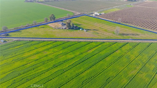 bird's eye view with a water view and a rural view