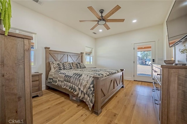 bedroom featuring ceiling fan and light hardwood / wood-style floors